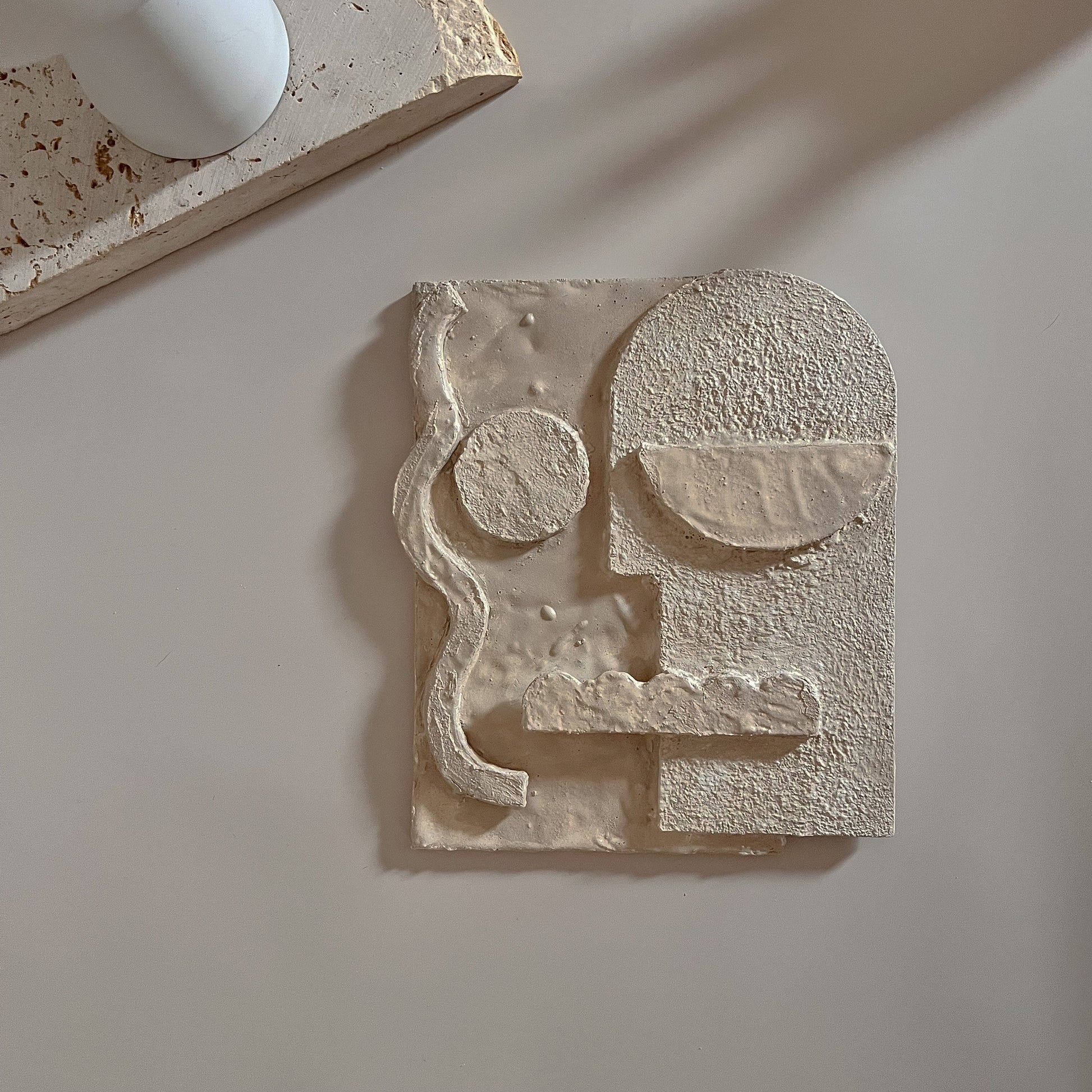 Textured plaster artwork from the Abstract Self Kit, finished in soft warm tones with abstract face layout.